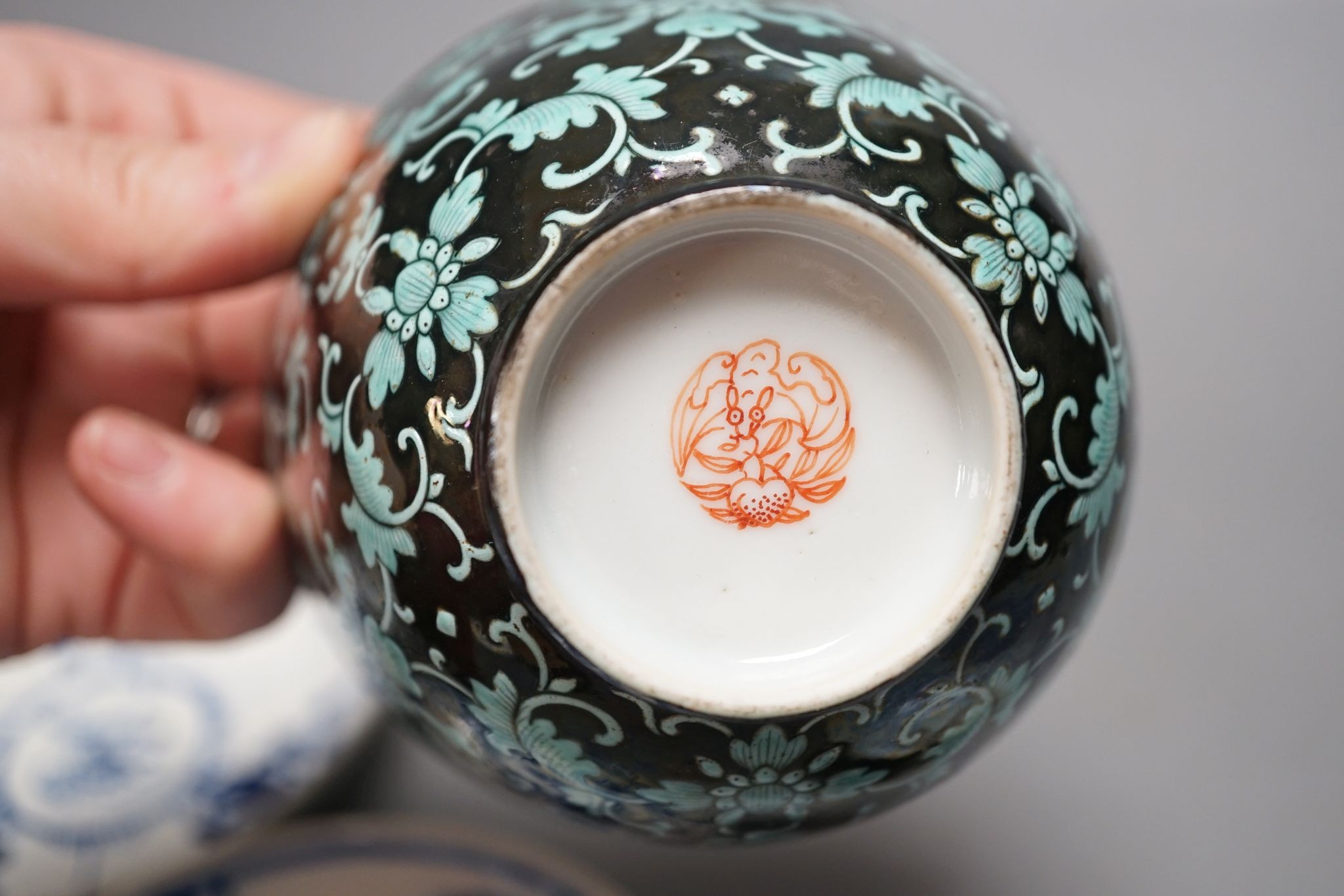 A 19th century Chinese black ground porcelain bowls and two covers, together with an three onion pattern blue and white tea bowls and saucers a/f